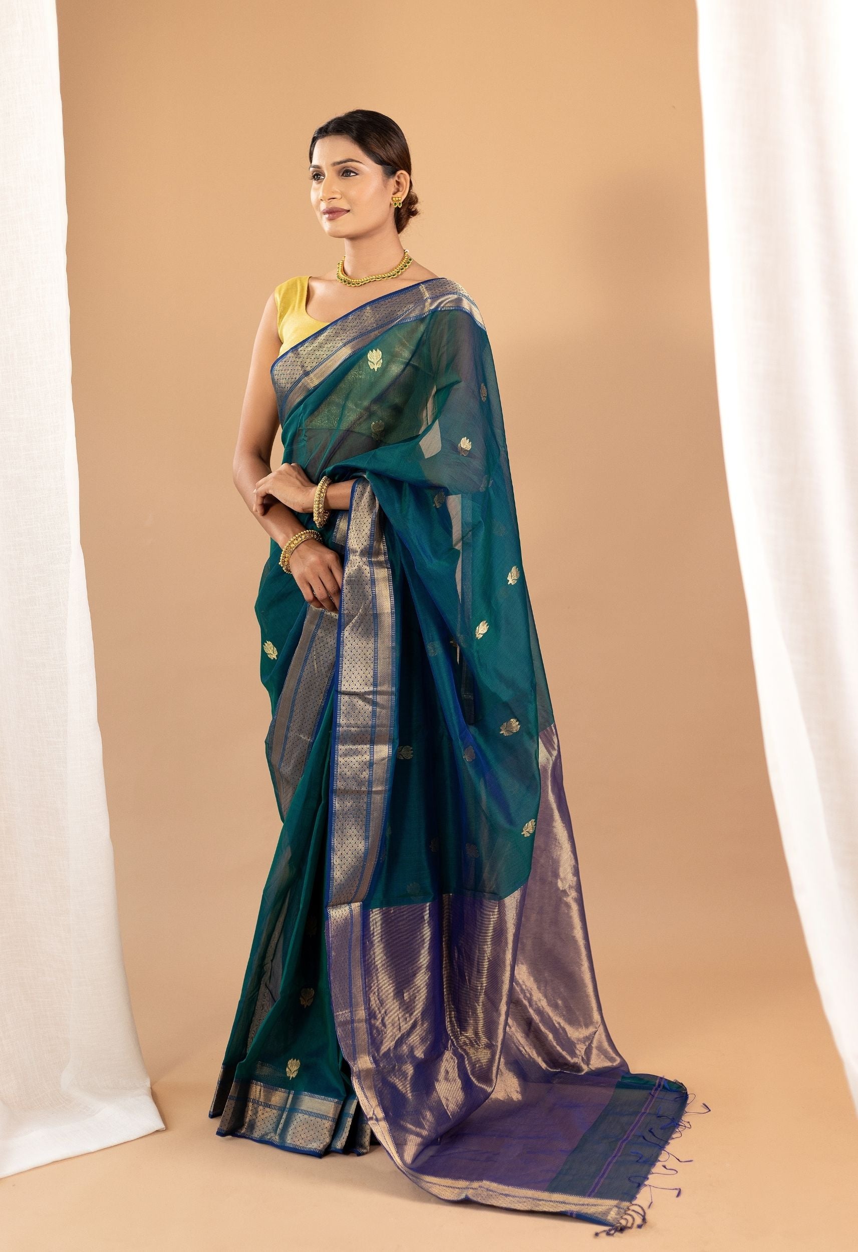 PEACOCK GREEN MAHESHWARI SILK SAREE WITH GOLEN ZARI WORK